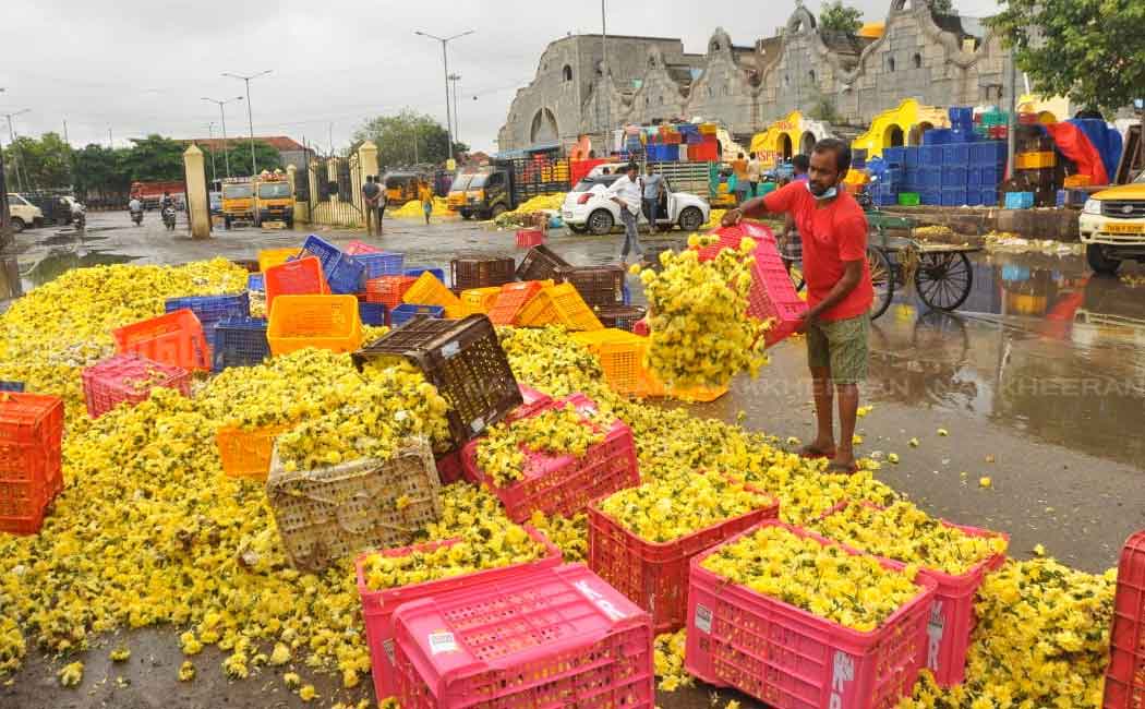 Flowers Traders dumping in the trash