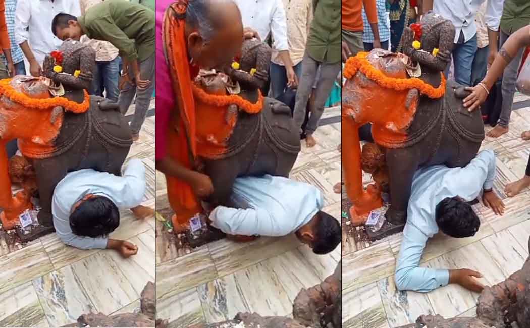 There is a commotion in the temple due to the person who got stuck between the legs of the elephant statue
