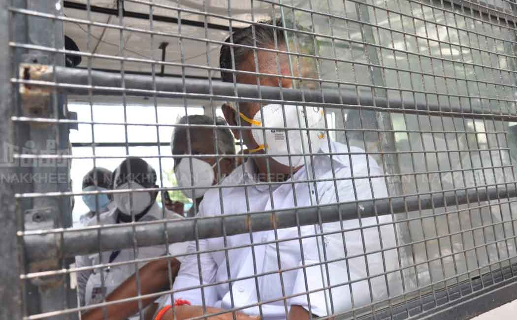 AIADMK MLAs sit on the road