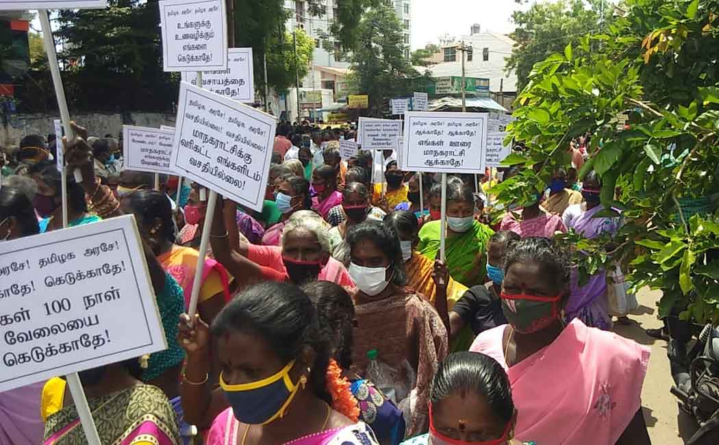Women carrying banners and protesting