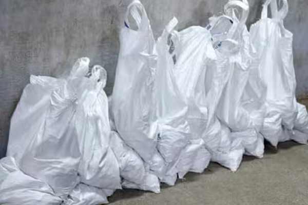 Husband bought 20 bundles of change to pay alimony to wife