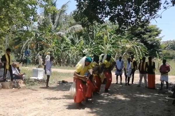Devotees break coconuts on their heads during temple festivals