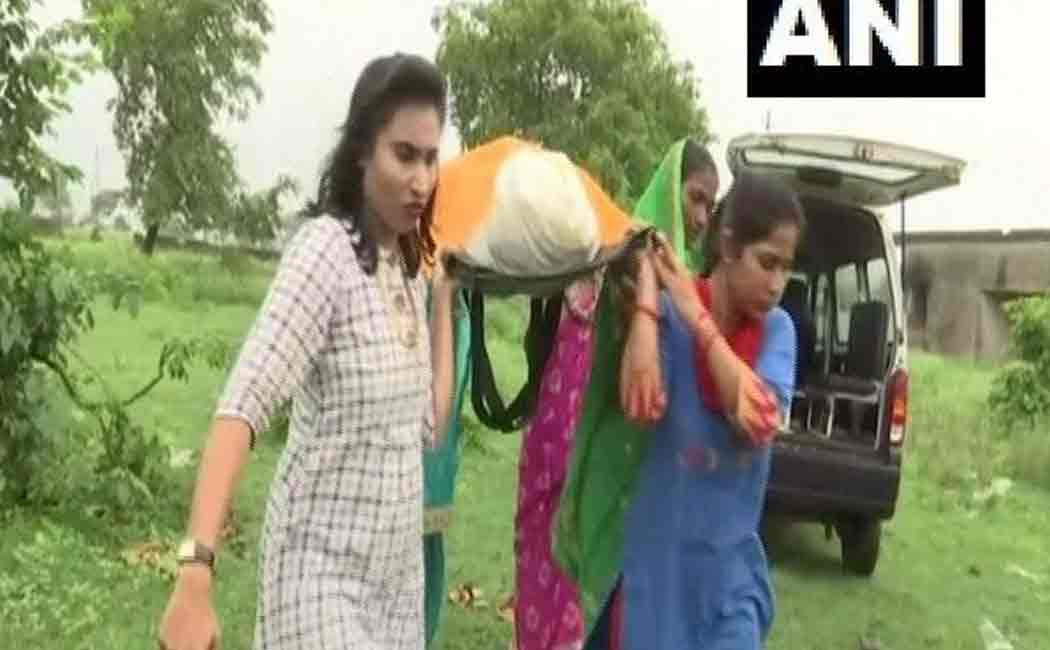 women activist performing last rituals of orphans