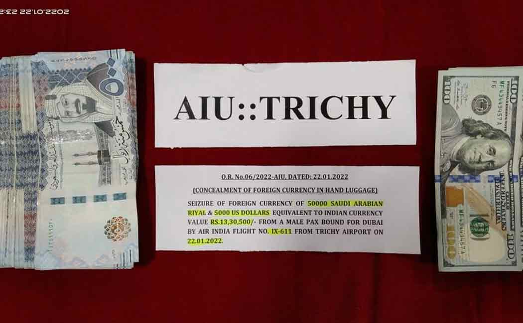 Air traveler trapped with foreign currency