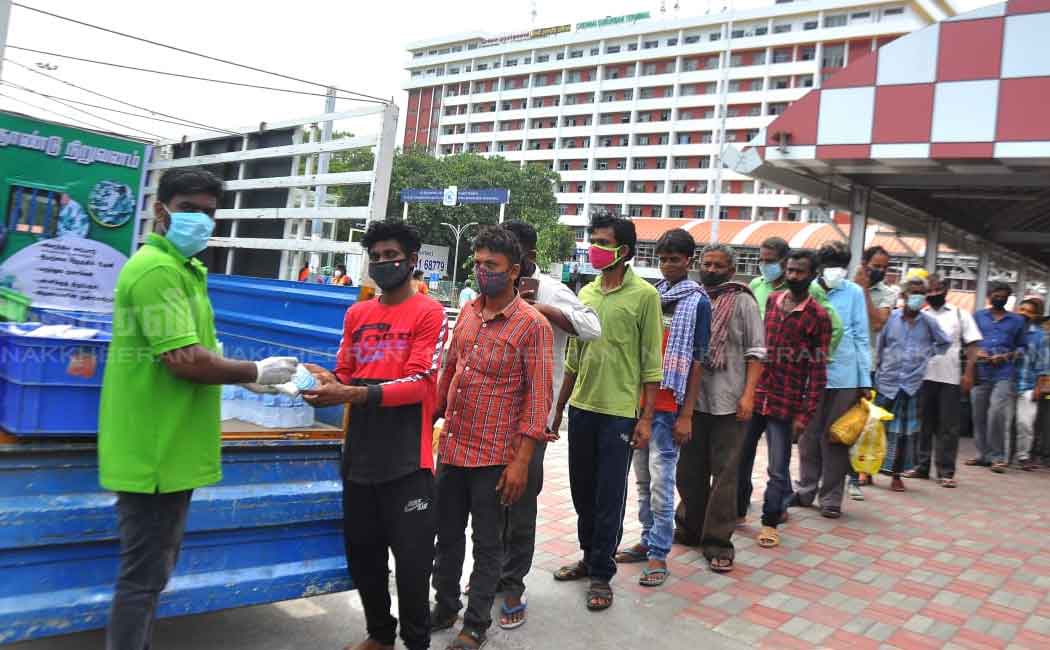 Volunteers feeding outlandish workers