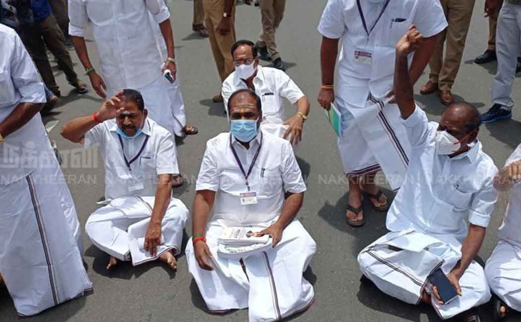 AIADMK MLAs sit on the road