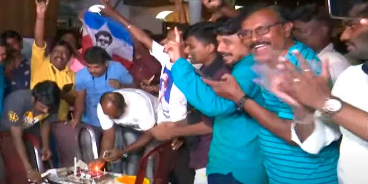 Rajinikanth's 73rd Birthday-Fans celebrate birthday by cutting cake in front of house