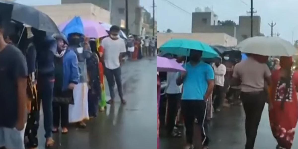 People waiting for vaccinations in pouring rain !!