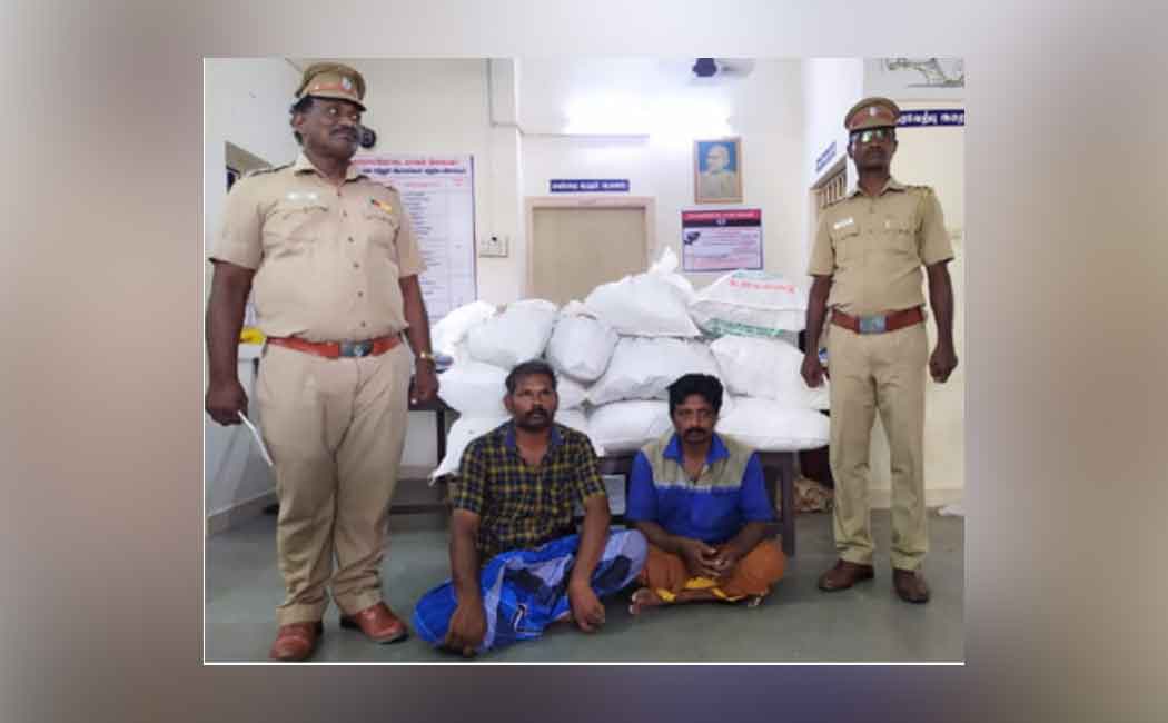 Two arrested for bringing banned items