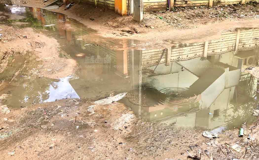drainage water overflows on road at mayiladuthurai