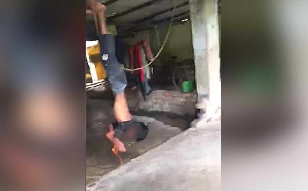 hanging a 14-year-old boy upside down and electrocuting him west bengal