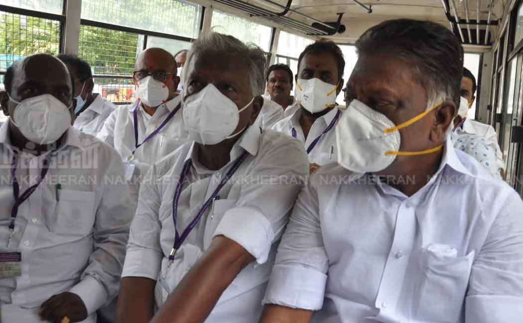 AIADMK MLAs sit on the road