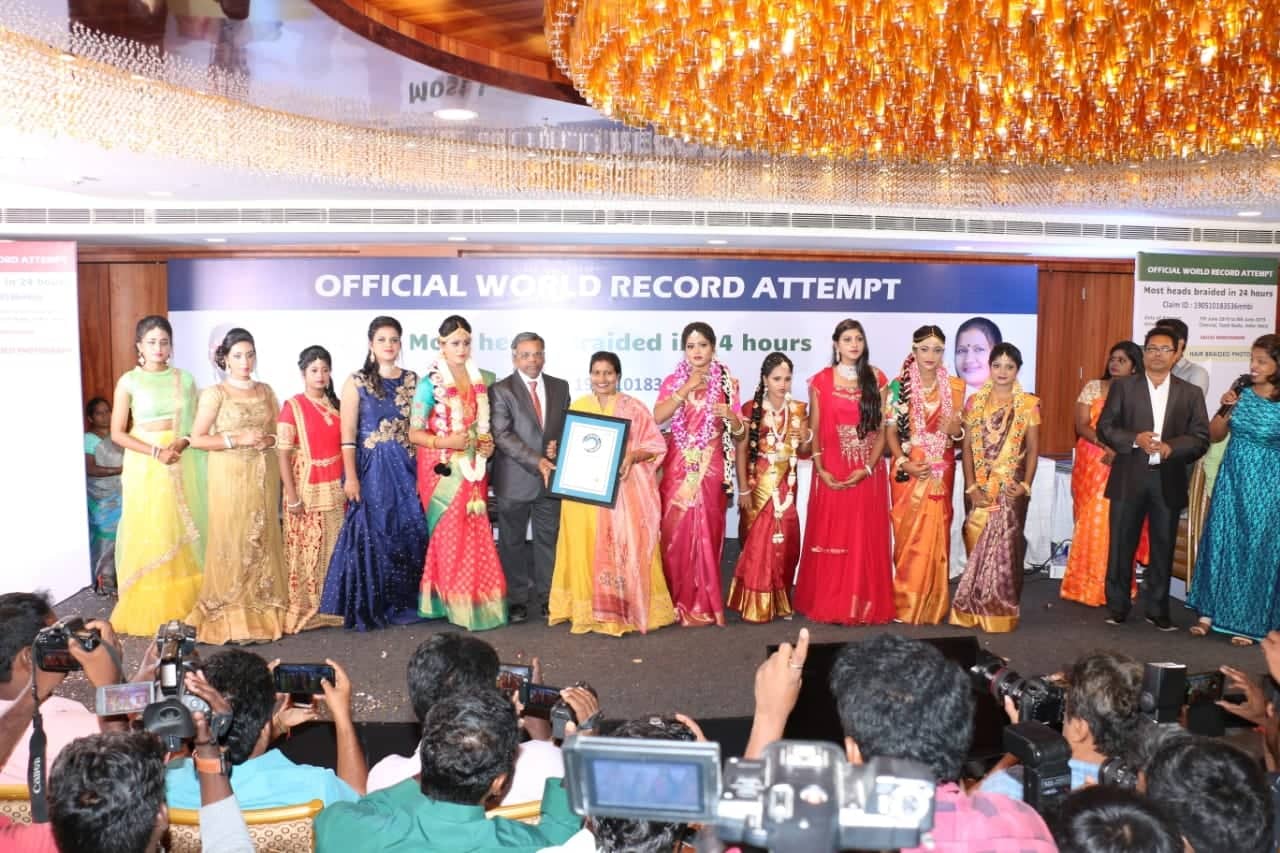 "Most Head's Braided in 24 Hours" new world recordof Chennai woman