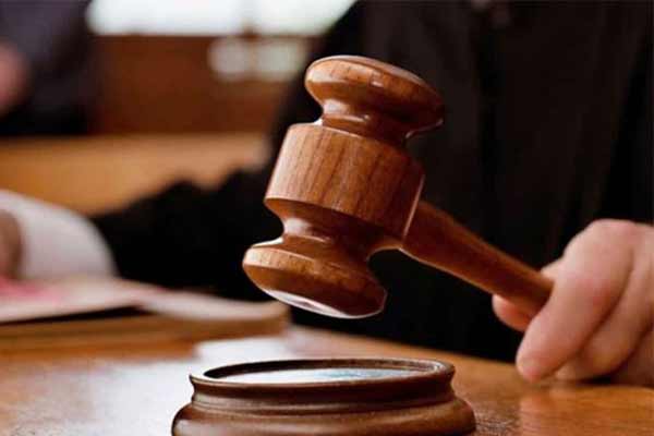 Prisoner throws slipper at judge