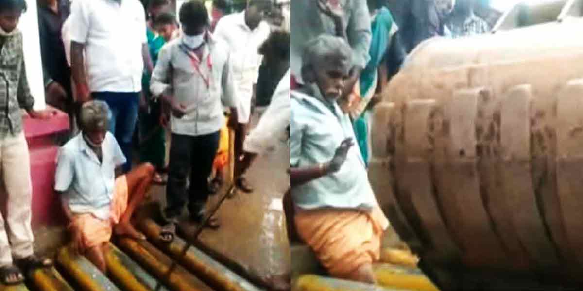 The old man trapped in the iron pipe path at the entrance to the collector complex