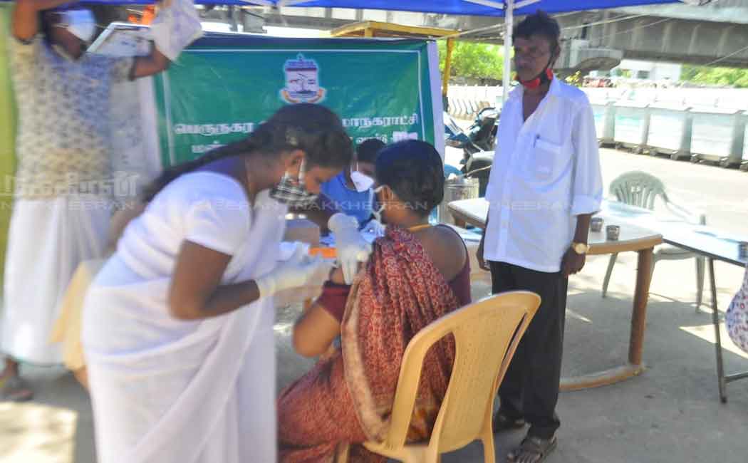 Corporation employees instructing people to get vaccinated through mic