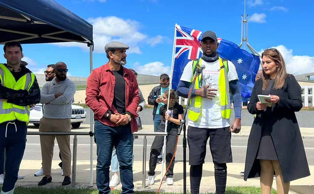 Dinushan is a cricketer who is traveling by bicycle for a permanent visa Australia
