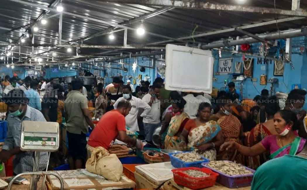 People gathered at the fish market