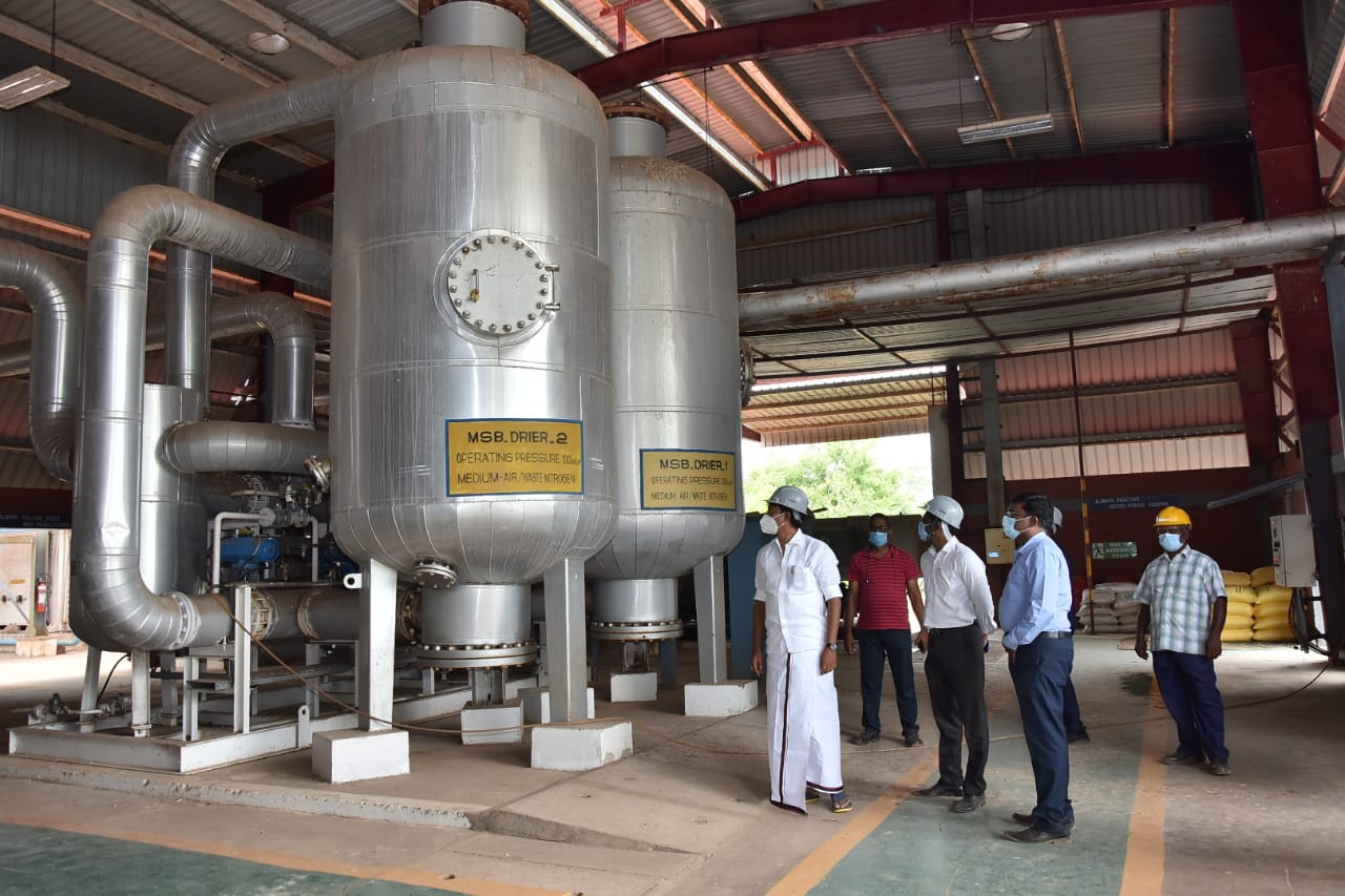 Minister Anbil Mahesh who inspected the oxygen production company