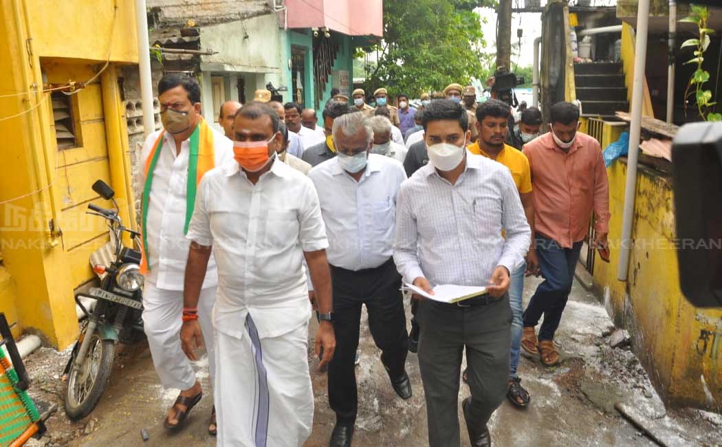 L. Murugan who went door to door campaigning to get vaccinated