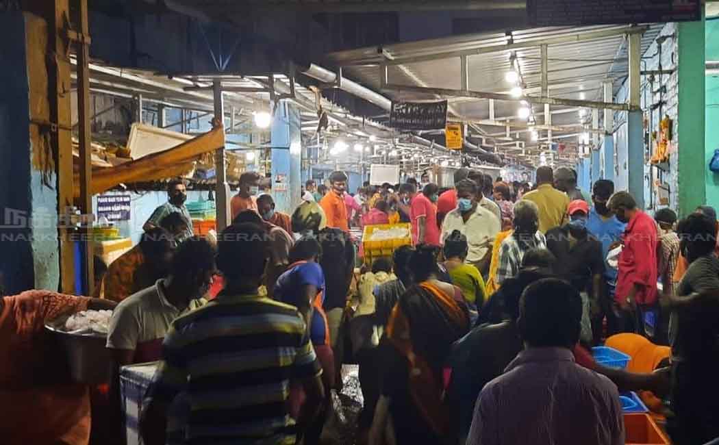 People gathered at the fish market