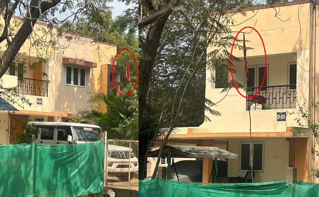 Saffron flag flying at the district SP bungalow