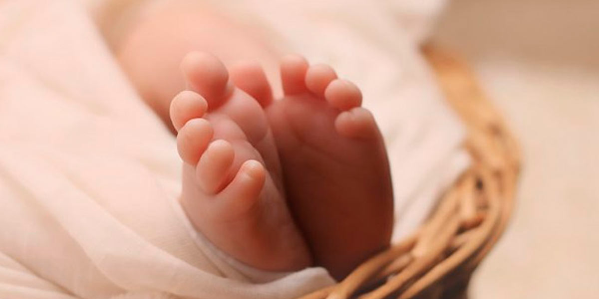 found a male child; Well in hospital