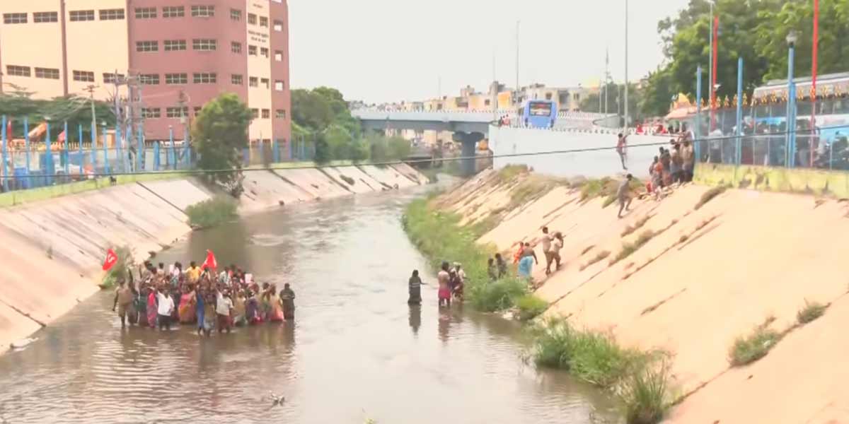 The contract cleaning workers went down to the river and struggle