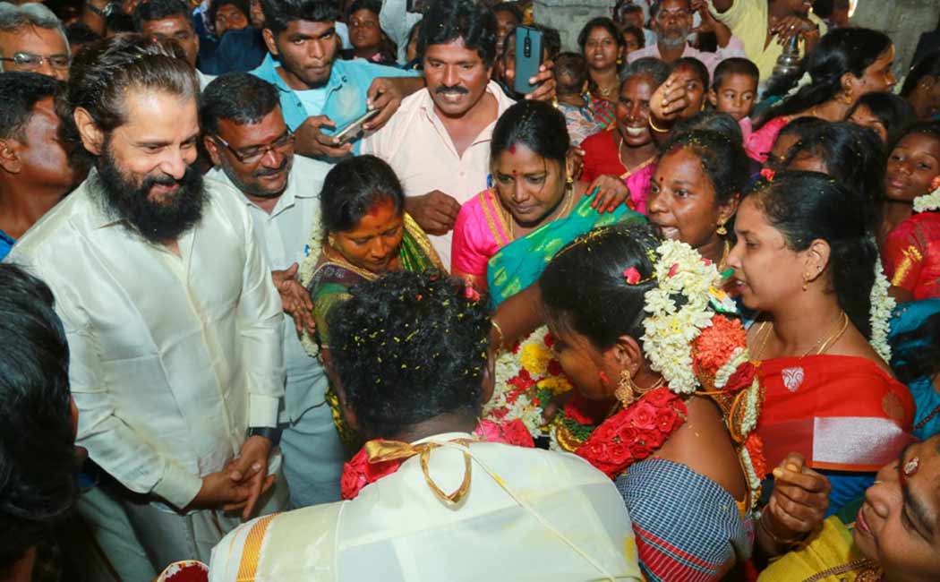 vikram attending the wedding of his home worker son