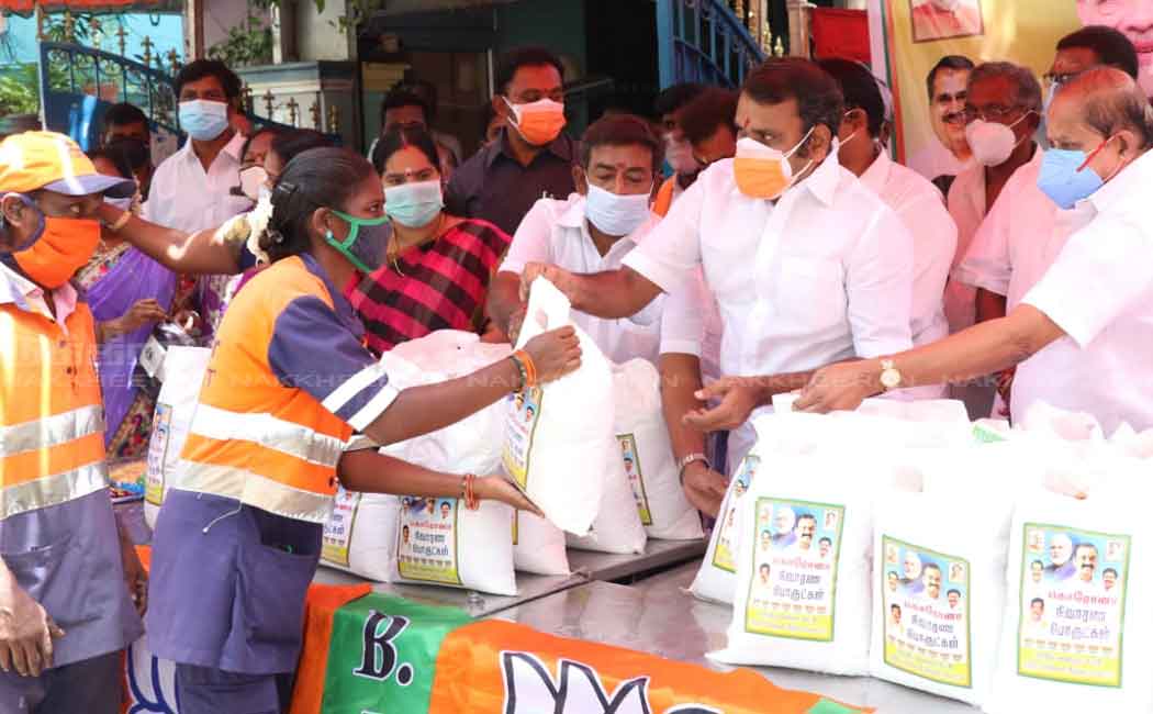 L. Murugan gives 'Modi Kit' to people