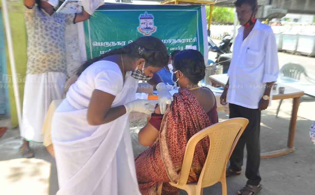 Corporation employees instructing people to get vaccinated through mic
