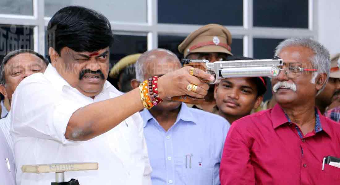 Gun in the hands of KT Rajendrapalaji!