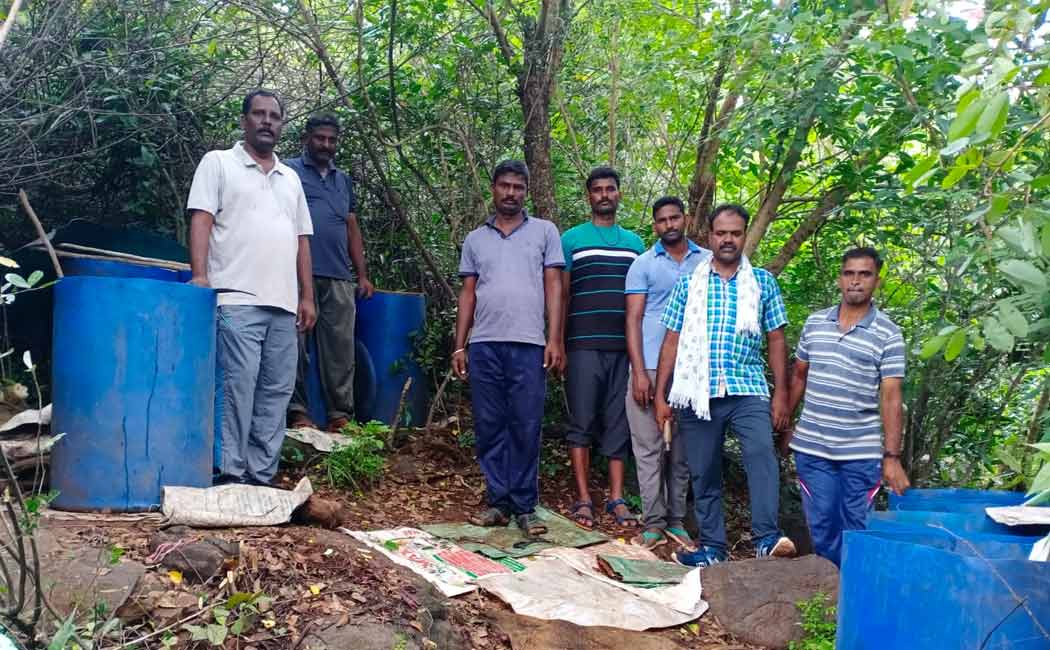 Police destroy liquor hoarding Kalvarayan Malai