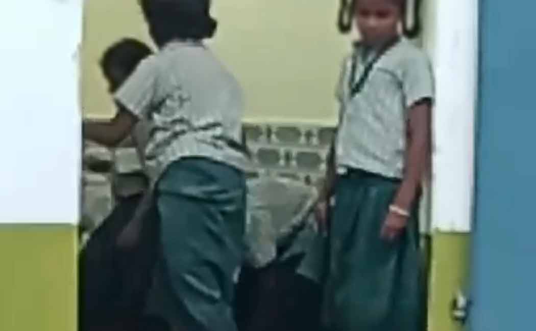 Students who cleaned the toilet in the government school