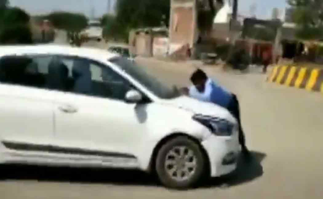 man in car