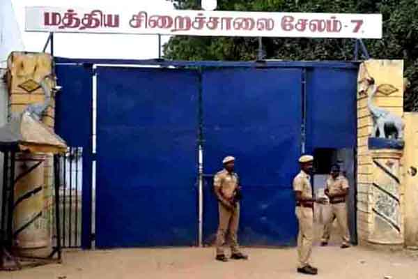 Prisoner barrage on prison guard; 2 arrested
