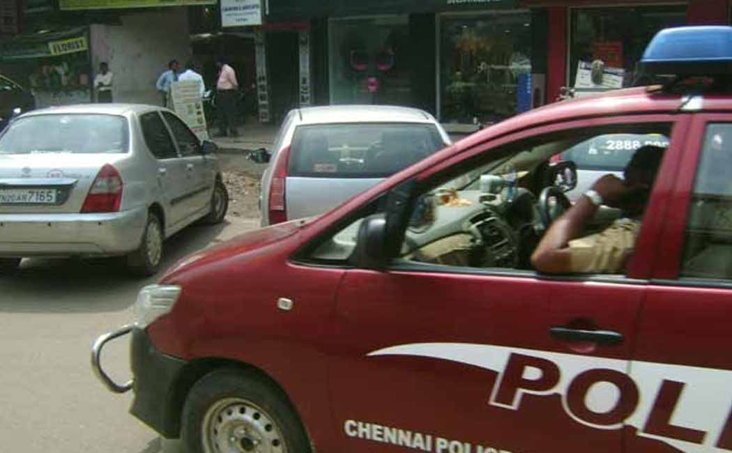ADMK member and his son surrender in broadway case