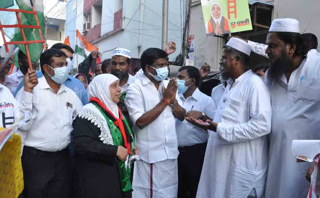 The minister who collected votes for the coalition candidate!