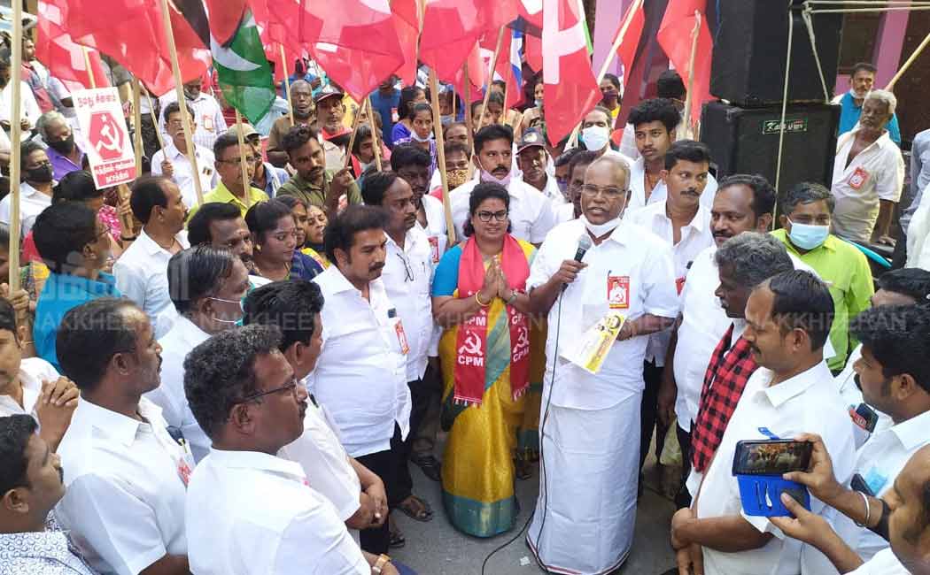 Marxist Communist Party candidate. Balakrishnan collects votes