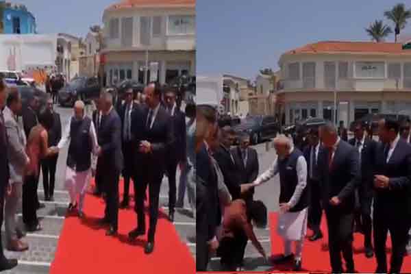 Cyprus MP falls at Prime Minister Modi's feet
