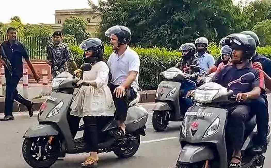 Rahul Gandhi riding a college student's bike