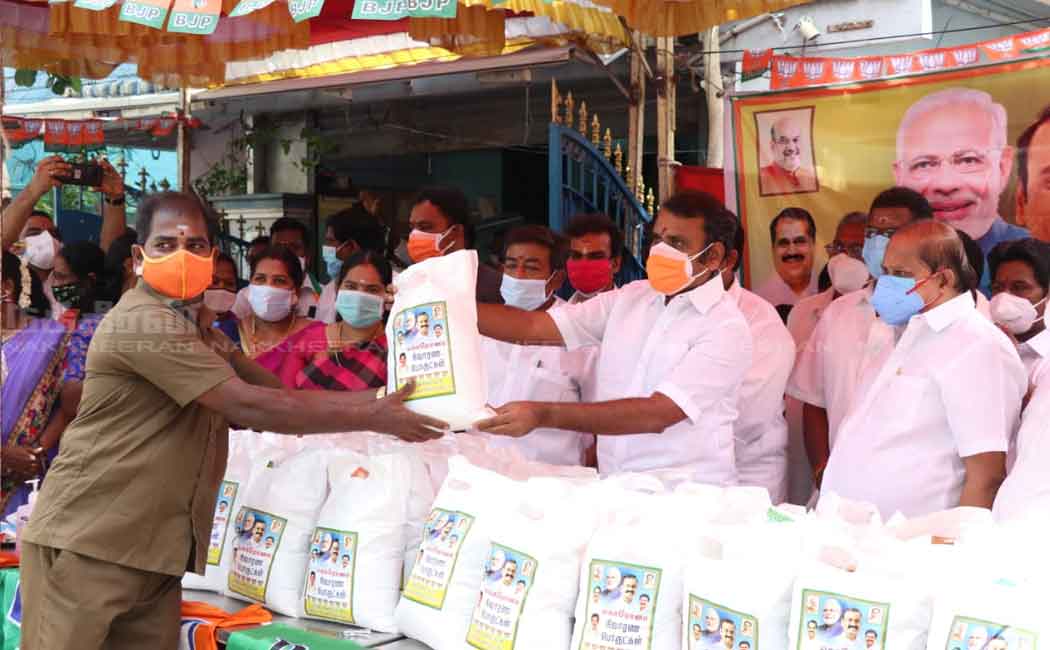L. Murugan gives 'Modi Kit' to people
