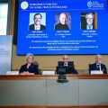  Nobel Prize in Physics shared with three