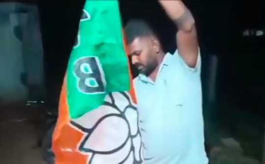 What is the background on BJP executive who set fire to BJP flag