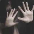 Police  misbehave a young woman who was walking alone 