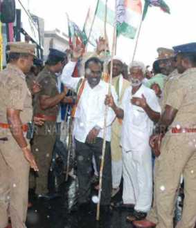 Congress protest in the rain condemning arrest Chidambaram